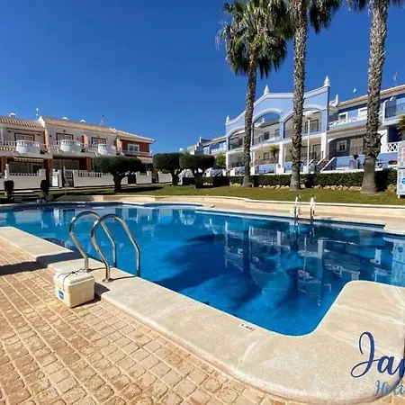 Laguna Townhouse Overlooking Communal Pool Lom01 Holiday home *
